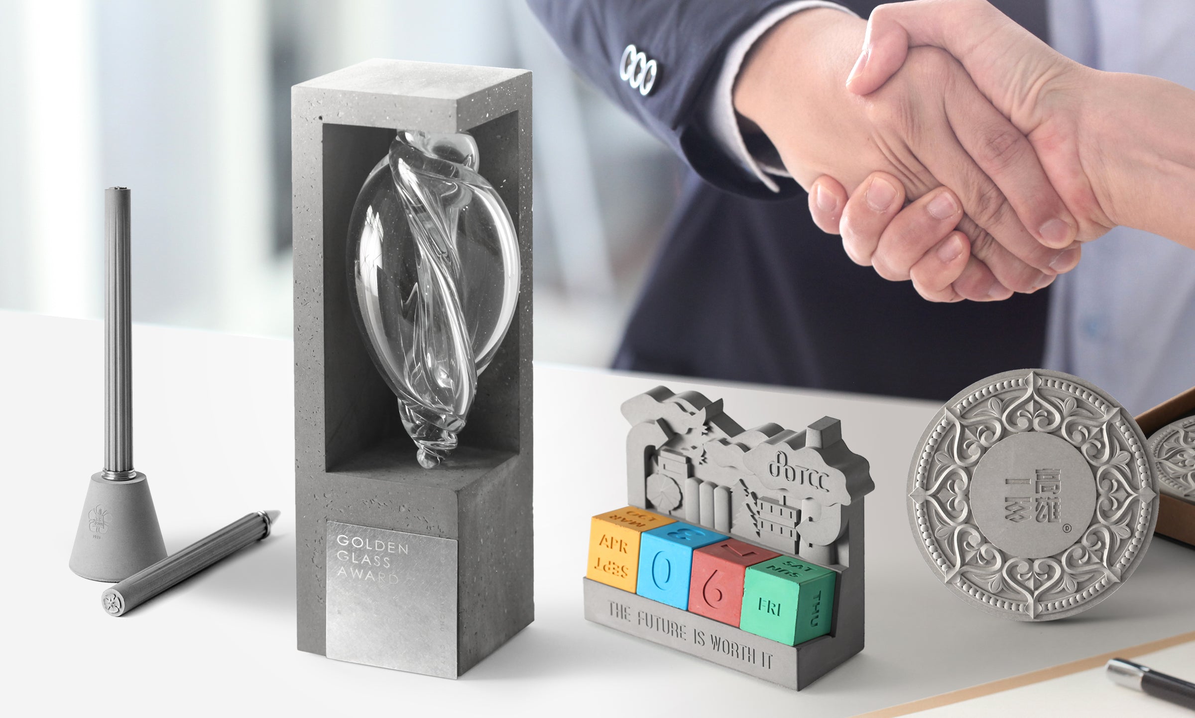 Bespoke deal toys, finance tombstones, and custom awards by 22STUDIO, featuring concrete-crafted recognition pieces designed to commemorate corporate milestones with modern elegance and creative impact.